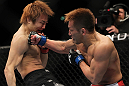 SAITAMA, JAPAN - FEBRUARY 26:  (R-L) Eiji Mitsuoka punches Takanori Gomi during the UFC 144 event at Saitama Super Arena on February 26, 2012 in Saitama, Japan.  (Photo by Josh Hedges/Zuffa LLC/Zuffa LLC via Getty Images) *** Local Caption *** Takanori Gomi; Eiji Mitsuoka