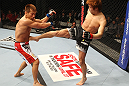 SAITAMA, JAPAN - FEBRUARY 26:  (R-L) Takanori Gomi kicks Eiji Mitsuoka during the UFC 144 event at Saitama Super Arena on February 26, 2012 in Saitama, Japan.  (Photo by Al Bello/Zuffa LLC/Zuffa LLC via Getty Images) *** Local Caption *** Takanori Gomi; Eiji Mitsuoka