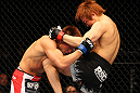 SAITAMA, JAPAN - FEBRUARY 26:  (R-L) Takanori Gomi delivers a knee strike against Eiji Mitsuoka during the UFC 144 event at Saitama Super Arena on February 26, 2012 in Saitama, Japan.  (Photo by Al Bello/Zuffa LLC/Zuffa LLC via Getty Images) *** Local Caption *** Takanori Gomi; Eiji Mitsuoka