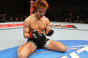 SAITAMA, JAPAN - FEBRUARY 26:  Takanori Gomi reacts after defeating Eiji Mitsuoka by TKO during the UFC 144 event at Saitama Super Arena on February 26, 2012 in Saitama, Japan.  (Photo by Al Bello/Zuffa LLC/Zuffa LLC via Getty Images) *** Local Caption *** Takanori Gomi