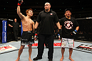 SAITAMA, JAPAN - FEBRUARY 26:  Takanori Gomi (L) reacts after defeating Eiji Mitsuoka by TKO during the UFC 144 event at Saitama Super Arena on February 26, 2012 in Saitama, Japan.  (Photo by Al Bello/Zuffa LLC/Zuffa LLC via Getty Images) *** Local Caption *** Takanori Gomi; Eiji Mitsuoka
