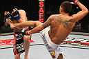 SAITAMA, JAPAN - FEBRUARY 26:  (R-L) Anthony Pettis kicks Joe Lauzon during the UFC 144 event at Saitama Super Arena on February 26, 2012 in Saitama, Japan.  (Photo by Al Bello/Zuffa LLC/Zuffa LLC via Getty Images) *** Local Caption *** Anthony Pettis; Joe Lauzon