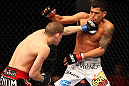 SAITAMA, JAPAN - FEBRUARY 26:  (L-R) Joe Lauzon punches Anthony Pettis during the UFC 144 event at Saitama Super Arena on February 26, 2012 in Saitama, Japan.  (Photo by Al Bello/Zuffa LLC/Zuffa LLC via Getty Images) *** Local Caption *** Anthony Pettis; Joe Lauzon