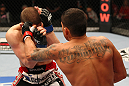 SAITAMA, JAPAN - FEBRUARY 26:  (R-L) Anthony Pettis punches Joe Lauzon during the UFC 144 event at Saitama Super Arena on February 26, 2012 in Saitama, Japan.  (Photo by Al Bello/Zuffa LLC/Zuffa LLC via Getty Images) *** Local Caption *** Anthony Pettis; Joe Lauzon