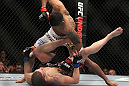 SAITAMA, JAPAN - FEBRUARY 26:  (R-L) Anthony Pettis knocks out Joe Lauzon during the UFC 144 event at Saitama Super Arena on February 26, 2012 in Saitama, Japan.  (Photo by Josh Hedges/Zuffa LLC/Zuffa LLC via Getty Images) *** Local Caption *** Anthony Pettis; Joe Lauzon