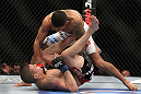 SAITAMA, JAPAN - FEBRUARY 26:  (R-L) Anthony Pettis knocks out Joe Lauzon during the UFC 144 event at Saitama Super Arena on February 26, 2012 in Saitama, Japan.  (Photo by Josh Hedges/Zuffa LLC/Zuffa LLC via Getty Images) *** Local Caption *** Anthony Pettis; Joe Lauzon