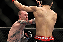 SAITAMA, JAPAN - FEBRUARY 26:  (L-R) Bart Palaszewski punches Hatsu Hioki during the UFC 144 event at Saitama Super Arena on February 26, 2012 in Saitama, Japan.  (Photo by Josh Hedges/Zuffa LLC/Zuffa LLC via Getty Images) *** Local Caption *** Hatsu Hioki; Bart Palaszewski