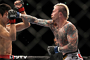 SAITAMA, JAPAN - FEBRUARY 26:  (R-L) Bart Palaszewski punches Hatsu Hioki during the UFC 144 event at Saitama Super Arena on February 26, 2012 in Saitama, Japan.  (Photo by Josh Hedges/Zuffa LLC/Zuffa LLC via Getty Images) *** Local Caption *** Hatsu Hioki; Bart Palaszewski