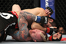 SAITAMA, JAPAN - FEBRUARY 26:  (R-L) Hatsu Hioki delivers an elbow strike against Bart Palaszewski during the UFC 144 event at Saitama Super Arena on February 26, 2012 in Saitama, Japan.  (Photo by Josh Hedges/Zuffa LLC/Zuffa LLC via Getty Images) *** Local Caption *** Hatsu Hioki; Bart Palaszewski