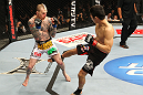 SAITAMA, JAPAN - FEBRUARY 26:  (R-L) Hatsu Hioki kicks Bart Palaszewski during the UFC 144 event at Saitama Super Arena on February 26, 2012 in Saitama, Japan.  (Photo by Al Bello/Zuffa LLC/Zuffa LLC via Getty Images) *** Local Caption *** Hatsu Hioki; Bart Palaszewski