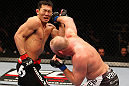 SAITAMA, JAPAN - FEBRUARY 26:  (R-L) Tim Boetsch punches Yushin Okami during the UFC 144 event at Saitama Super Arena on February 26, 2012 in Saitama, Japan.  (Photo by Al Bello/Zuffa LLC/Zuffa LLC via Getty Images) *** Local Caption *** Yushin Okami; Tim Boetsch