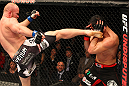SAITAMA, JAPAN - FEBRUARY 26:  (L-R) Tim Boetsch kicks Yushin Okami during the UFC 144 event at Saitama Super Arena on February 26, 2012 in Saitama, Japan.  (Photo by Al Bello/Zuffa LLC/Zuffa LLC via Getty Images) *** Local Caption *** Yushin Okami; Tim Boetsch