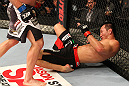 SAITAMA, JAPAN - FEBRUARY 26:  Yushin Okami lies on the canvas after being knocked down by a punch from Tim Boetsch during the UFC 144 event at Saitama Super Arena on February 26, 2012 in Saitama, Japan.  (Photo by Al Bello/Zuffa LLC/Zuffa LLC via Getty Images) *** Local Caption *** Yushin Okami; Tim Boetsch