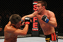SAITAMA, JAPAN - FEBRUARY 26:  (R-L) Jake Shields punches Yoshihiro Akiyama during the UFC 144 event at Saitama Super Arena on February 26, 2012 in Saitama, Japan.  (Photo by Al Bello/Zuffa LLC/Zuffa LLC via Getty Images) *** Local Caption *** Yoshihiro Akiyama; Jake Shields