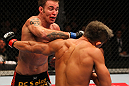 SAITAMA, JAPAN - FEBRUARY 26:  (L-R) Jake Shields punches Yoshihiro Akiyama during the UFC 144 event at Saitama Super Arena on February 26, 2012 in Saitama, Japan.  (Photo by Al Bello/Zuffa LLC/Zuffa LLC via Getty Images) *** Local Caption *** Yoshihiro Akiyama; Jake Shields