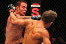 SAITAMA, JAPAN - FEBRUARY 26:  (L-R) Jake Shields punches Yoshihiro Akiyama during the UFC 144 event at Saitama Super Arena on February 26, 2012 in Saitama, Japan.  (Photo by Al Bello/Zuffa LLC/Zuffa LLC via Getty Images) *** Local Caption *** Yoshihiro Akiyama; Jake Shields