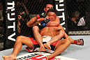 SAITAMA, JAPAN - FEBRUARY 26:  (L-R) Jake Shields attempts a rear choke submission against Yoshihiro Akiyama during the UFC 144 event at Saitama Super Arena on February 26, 2012 in Saitama, Japan.  (Photo by Al Bello/Zuffa LLC/Zuffa LLC via Getty Images) *** Local Caption *** Yoshihiro Akiyama; Jake Shields