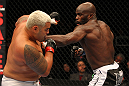 SAITAMA, JAPAN - FEBRUARY 26:  (R-L) Cheick Kongo punches Mark Hunt during the UFC 144 event at Saitama Super Arena on February 26, 2012 in Saitama, Japan.  (Photo by Al Bello/Zuffa LLC/Zuffa LLC via Getty Images) *** Local Caption *** Mark Hunt; Cheick Kongo
