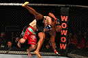 SAITAMA, JAPAN - FEBRUARY 26:  (L-R) Ryan Bader takes down Quinton "Rampage" Jackson during the UFC 144 event at Saitama Super Arena on February 26, 2012 in Saitama, Japan.  (Photo by Al Bello/Zuffa LLC/Zuffa LLC via Getty Images) *** Local Caption *** Quinton Jackson; Ryan Bader
