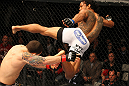 SAITAMA, JAPAN - FEBRUARY 26:  (R-L) Benson Henderson kicks Frankie Edgar during the UFC 144 event at Saitama Super Arena on February 26, 2012 in Saitama, Japan.  (Photo by Al Bello/Zuffa LLC/Zuffa LLC via Getty Images) *** Local Caption *** Frankie Edgar; Benson Henderson