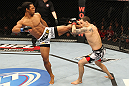 SAITAMA, JAPAN - FEBRUARY 26:  (L-R) Benson Henderson kicks Frankie Edgar during the UFC 144 event at Saitama Super Arena on February 26, 2012 in Saitama, Japan.  (Photo by Al Bello/Zuffa LLC/Zuffa LLC via Getty Images) *** Local Caption *** Frankie Edgar; Benson Henderson