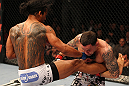 SAITAMA, JAPAN - FEBRUARY 26:  (L-R) Benson Henderson punches Frankie Edgar during the UFC 144 event at Saitama Super Arena on February 26, 2012 in Saitama, Japan.  (Photo by Al Bello/Zuffa LLC/Zuffa LLC via Getty Images) *** Local Caption *** Frankie Edgar; Benson Henderson