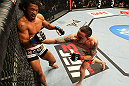 SAITAMA, JAPAN - FEBRUARY 26:  (R-L) Frankie Edgar punches Benson Henderson during the UFC 144 event at Saitama Super Arena on February 26, 2012 in Saitama, Japan.  (Photo by Al Bello/Zuffa LLC/Zuffa LLC via Getty Images) *** Local Caption *** Frankie Edgar; Benson Henderson