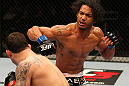 SAITAMA, JAPAN - FEBRUARY 26:  (R-L) Benson Henderson punches Frankie Edgar during the UFC 144 event at Saitama Super Arena on February 26, 2012 in Saitama, Japan.  (Photo by Al Bello/Zuffa LLC/Zuffa LLC via Getty Images) *** Local Caption *** Frankie Edgar; Benson Henderson