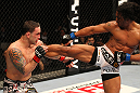 SAITAMA, JAPAN - FEBRUARY 26:  (R-L) Benson Henderson kicks Frankie Edgar during the UFC 144 event at Saitama Super Arena on February 26, 2012 in Saitama, Japan.  (Photo by Al Bello/Zuffa LLC/Zuffa LLC via Getty Images) *** Local Caption *** Frankie Edgar; Benson Henderson