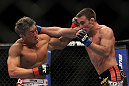 SAITAMA, JAPAN - FEBRUARY 26:  (R-L) Jake Shields and Yoshihiro Akiyama trade punches during the UFC 144 event at Saitama Super Arena on February 26, 2012 in Saitama, Japan.  (Photo by Josh Hedges/Zuffa LLC/Zuffa LLC via Getty Images) *** Local Caption *** Yoshihiro Akiyama; Jake Shields