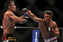 SAITAMA, JAPAN - FEBRUARY 26:  (R-L) Yoshihiro Akiyama punches Jake Shields during the UFC 144 event at Saitama Super Arena on February 26, 2012 in Saitama, Japan.  (Photo by Josh Hedges/Zuffa LLC/Zuffa LLC via Getty Images) *** Local Caption *** Yoshihiro Akiyama; Jake Shields