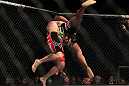 SAITAMA, JAPAN - FEBRUARY 26:  (L-R) Ryan Bader takes down Quinton "Rampage" Jackson during the UFC 144 event at Saitama Super Arena on February 26, 2012 in Saitama, Japan.  (Photo by Josh Hedges/Zuffa LLC/Zuffa LLC via Getty Images) *** Local Caption *** Quinton Jackson; Ryan Bader