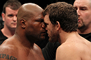 SAITAMA, JAPAN - FEBRUARY 26:  (L-R) Opponents Quinton "Rampage" Jackson and Ryan Bader receive final instructions from the referee before their bout during the UFC 144 event at Saitama Super Arena on February 26, 2012 in Saitama, Japan.  (Photo by Josh Hedges/Zuffa LLC/Zuffa LLC via Getty Images) *** Local Caption *** Quinton Jackson; Ryan Bader