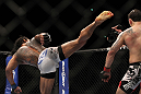SAITAMA, JAPAN - FEBRUARY 26:  (L-R) Benson Henderson kicks Frankie Edgar during the UFC 144 event at Saitama Super Arena on February 26, 2012 in Saitama, Japan.  (Photo by Josh Hedges/Zuffa LLC/Zuffa LLC via Getty Images) *** Local Caption *** Frankie Edgar; Benson Henderson