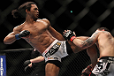 SAITAMA, JAPAN - FEBRUARY 26:  (L-R) Benson Henderson kicks Frankie Edgar during the UFC 144 event at Saitama Super Arena on February 26, 2012 in Saitama, Japan.  (Photo by Josh Hedges/Zuffa LLC/Zuffa LLC via Getty Images) *** Local Caption *** Frankie Edgar; Benson Henderson