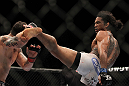 SAITAMA, JAPAN - FEBRUARY 26:  (R-L) Benson Henderson kicks Frankie Edgar during the UFC 144 event at Saitama Super Arena on February 26, 2012 in Saitama, Japan.  (Photo by Josh Hedges/Zuffa LLC/Zuffa LLC via Getty Images) *** Local Caption *** Frankie Edgar; Benson Henderson