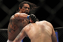 SAITAMA, JAPAN - FEBRUARY 26:  (L-R) Benson Henderson punches Frankie Edgar during the UFC 144 event at Saitama Super Arena on February 26, 2012 in Saitama, Japan.  (Photo by Josh Hedges/Zuffa LLC/Zuffa LLC via Getty Images) *** Local Caption *** Frankie Edgar; Benson Henderson