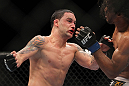 SAITAMA, JAPAN - FEBRUARY 26:  (L-R) Frankie Edgar punches Benson Henderson during the UFC 144 event at Saitama Super Arena on February 26, 2012 in Saitama, Japan.  (Photo by Josh Hedges/Zuffa LLC/Zuffa LLC via Getty Images) *** Local Caption *** Frankie Edgar; Benson Henderson
