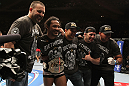 SAITAMA, JAPAN - FEBRUARY 26:  Benson Henderson (second from left) poses for a photo with his team after defeating Frankie Edgar to win the UFC Lightweight Championship during the UFC 144 event at Saitama Super Arena on February 26, 2012 in Saitama, Japan.  (Photo by Josh Hedges/Zuffa LLC/Zuffa LLC via Getty Images) *** Local Caption *** Benson Henderson