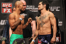 SYDNEY, AUSTRALIA - MARCH 02:  (L-R) Flyweight opponents Demetrious Johnson and Ian McCall face off ater weighing in during the UFC on FX official weigh in at Allphones Arena on March 2, 2012 in Sydney, Australia.  (Photo by Josh Hedges/Zuffa LLC/Zuffa LLC via Getty Images) *** Local Caption *** Demetrious Johnson; Ian McCall