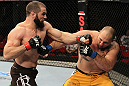 SYDNEY, AUSTRALIA - MARCH 03:  (L-R) Oli Thompson punches Shawn Jordan in a heavyweight bout during the UFC on FX event at Allphones Arena on March 3, 2012 in Sydney, Australia.  (Photo by Josh Hedges/Zuffa LLC/Zuffa LLC via Getty Images) *** Local Caption *** Oli Thompson; Shawn Jordan