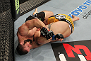 SYDNEY, AUSTRALIA - MARCH 03:  (L-R) Oli Thompson attempts a shoulder lock submission against Shawn Jordan in a heavyweight bout during the UFC on FX event at Allphones Arena on March 3, 2012 in Sydney, Australia.  (Photo by Josh Hedges/Zuffa LLC/Zuffa LLC via Getty Images) *** Local Caption *** Oli Thompson; Shawn Jordan