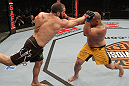 SYDNEY, AUSTRALIA - MARCH 03:  (L-R) Oli Thompson punches Shawn Jordan in a heavyweight bout during the UFC on FX event at Allphones Arena on March 3, 2012 in Sydney, Australia.  (Photo by Josh Hedges/Zuffa LLC/Zuffa LLC via Getty Images) *** Local Caption *** Oli Thompson; Shawn Jordan