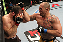 SYDNEY, AUSTRALIA - MARCH 03:  (R-L) Shawn Jordan punches Oli Thompson in their heavyweight bout during the UFC on FX event at Allphones Arena on March 3, 2012 in Sydney, Australia.  (Photo by Josh Hedges/Zuffa LLC/Zuffa LLC via Getty Images) *** Local Caption *** Oli Thompson; Shawn Jordan
