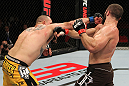 SYDNEY, AUSTRALIA - MARCH 03:  (L-R) Shawn Jordan punches Oli Thompson in their heavyweight bout during the UFC on FX event at Allphones Arena on March 3, 2012 in Sydney, Australia.  (Photo by Josh Hedges/Zuffa LLC/Zuffa LLC via Getty Images) *** Local Caption *** Oli Thompson; Shawn Jordan