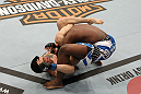 SYDNEY, AUSTRALIA - MARCH 03:  (L-R) Daniel Pineda secures a triangle choke submission hold against Mackens Semerzier during the UFC on FX event at Allphones Arena on March 3, 2012 in Sydney, Australia.  (Photo by Josh Hedges/Zuffa LLC/Zuffa LLC via Getty Images) *** Local Caption *** Mackens Semerzier; Daniel Pineda