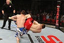 SYDNEY, AUSTRALIA - MARCH 03:  (R-L) TJ Waldburger secures an arm bar submission against Jake Hecht in their welterweight bout during the UFC on FX event at Allphones Arena on March 3, 2012 in Sydney, Australia.  (Photo by Josh Hedges/Zuffa LLC/Zuffa LLC via Getty Images) *** Local Caption *** TJ Waldburger; Jake Hecht