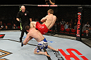 SYDNEY, AUSTRALIA - MARCH 03:  (R-L) TJ Waldburger secures an arm bar submission against Jake Hecht in their welterweight bout during the UFC on FX event at Allphones Arena on March 3, 2012 in Sydney, Australia.  (Photo by Josh Hedges/Zuffa LLC/Zuffa LLC via Getty Images) *** Local Caption *** TJ Waldburger; Jake Hecht