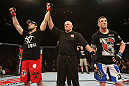 SYDNEY, AUSTRALIA - MARCH 03:  TJ Waldburger (L) reacts after defeating Jake Hecht (R) by submission during the UFC on FX event at Allphones Arena on March 3, 2012 in Sydney, Australia.  (Photo by Josh Hedges/Zuffa LLC/Zuffa LLC via Getty Images) *** Local Caption *** TJ Waldburger