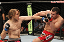 SYDNEY, AUSTRALIA - MARCH 03:  (L-R) Andrew Craig punches Kyle Noke during a middleweight bout during the UFC on FX event at Allphones Arena on March 3, 2012 in Sydney, Australia.  (Photo by Josh Hedges/Zuffa LLC/Zuffa LLC via Getty Images) *** Local Caption *** Kyle Noke; Andrew Craig